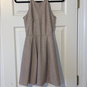 Gold pleated halter dress.